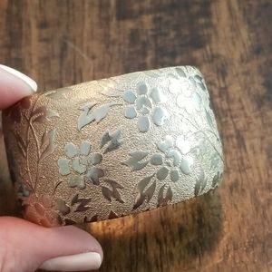 Gold tone floral cuff